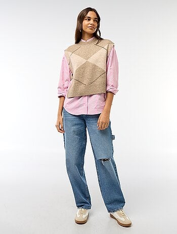 Mouwloze trui met knooplintjes aan weerszijden