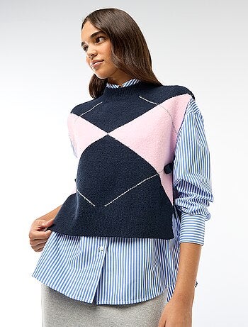 Mouwloze trui met knooplintjes aan weerszijden