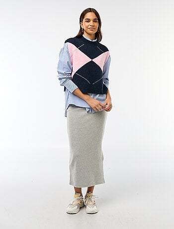 Mouwloze trui met knooplintjes aan weerszijden