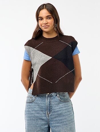 Mouwloze trui met knooplintjes aan weerszijden