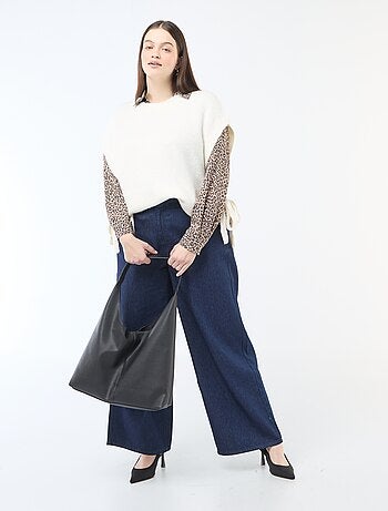 Mouwloze trui om aan de zijkanten te strikken