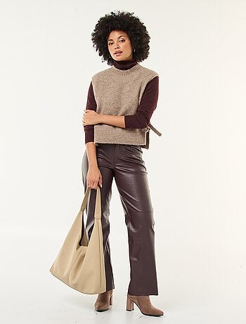 Mouwloze trui van bouclé met strikdetail