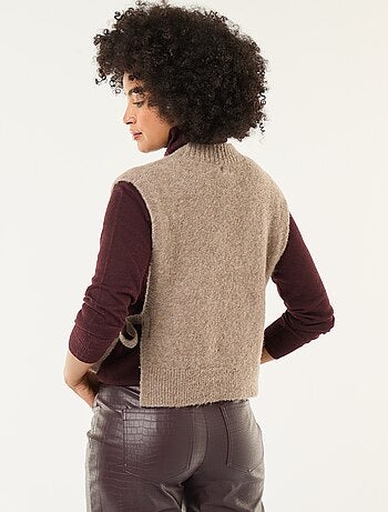 Mouwloze trui van bouclé met strikdetail