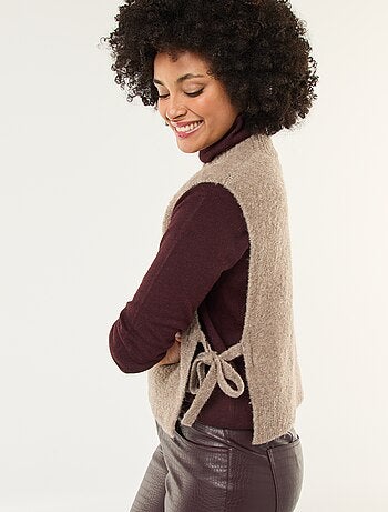 Mouwloze trui van bouclé met strikdetail