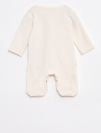 Pyjama/slaappakje van velours met voetjes en katprint