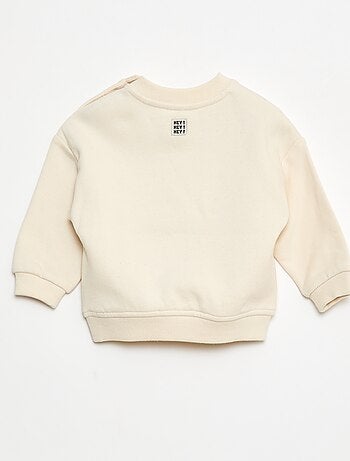 Sweater van geruwde joggingstof met borduursel 'cool'
