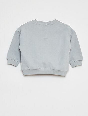 Sweater van joggingstof met applicatie in reliëf