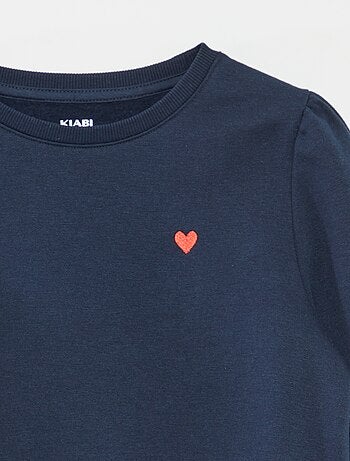 Sweater van joggingstof met borduursel en fronsjes op de schouder