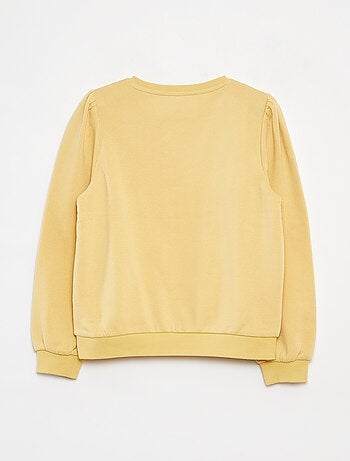 Sweater van joggingstof met borduursel en fronsjes op de schouder