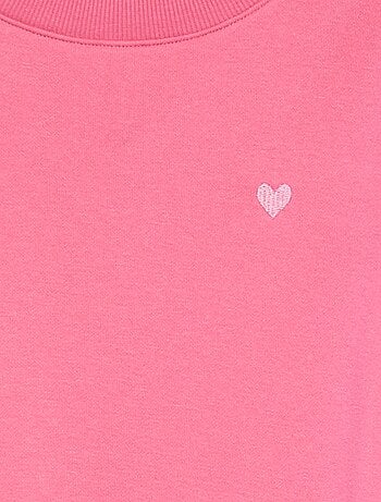 Sweater van joggingstof met borduursel en fronsjes op de schouder